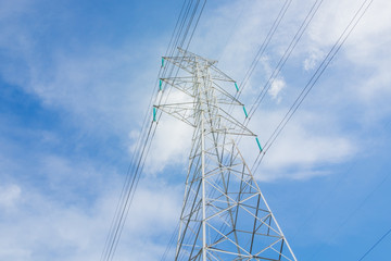 High voltage post, High voltage tower at blue sky background