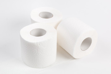 Roll of toilet paper on white background