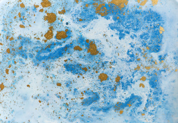 Blue and golden liquid texture. Watercolor hand drawn marbling illustration. Ink marble background.