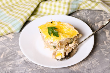 Mashed Potato Bake witn chicken and cheese, decorated parsley