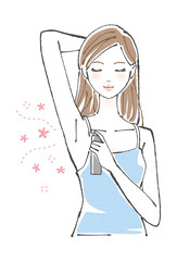 デオドラントスプレーを使う女性　ロングヘア