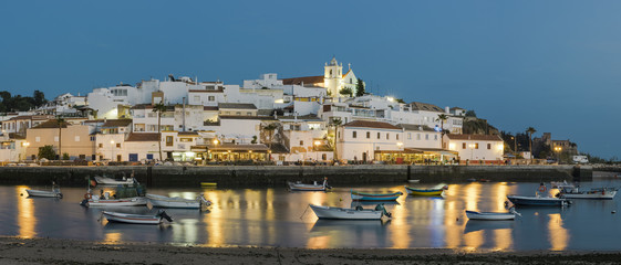 Evening panorama of Ferragudo fishing village in Agarve,Portugal