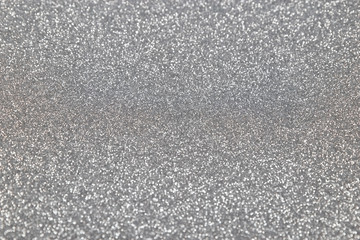 Fototapeta premium Silver glitter background. Abstract shiny texture.