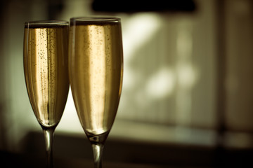 Two glasses of champagne with blurred background