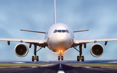 Airplane taking off from airport runway