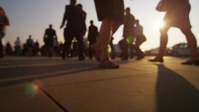  Low angle view, the feet of city workers and tourists walking through London