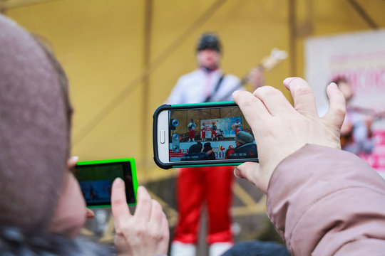 Female hands taking photo with smart phone