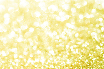 Gold bokeh texture. Festive glitter background with defocused lights