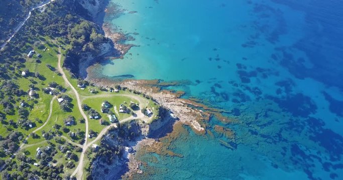 flying over the island. Landscape. Mediterranean Sea and the coast.  Cyprus. City resort. Drone Point of View. Blue lagoon with rocks and stones. paradise.