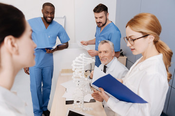 Obraz premium Smart students passing exam in the medical university