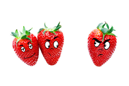 Ripe red strawberries with emotions on the faces on a white background. Isolated