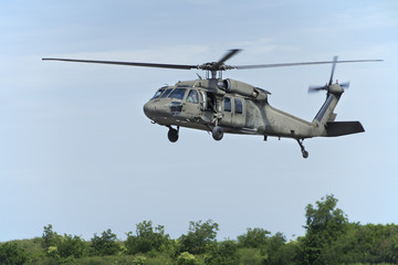 helicopter floating in sky