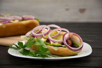 Hot dog with vegetables