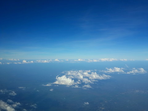 Blue sky and clouds. The view from the plane.