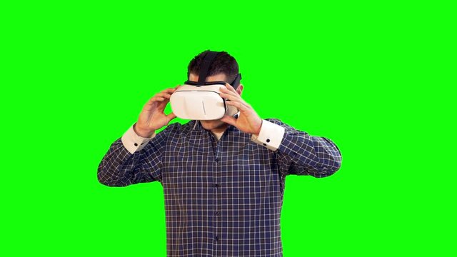Greenscreen Virtual Reality Man Looking Up and Down in 360 Glasses