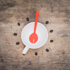cup of coffee, coffee beans on wooden table, Clock concept