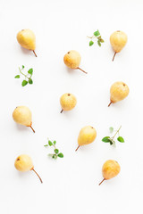 Pears on white background. Pattern made of piers. Flat lay, top view