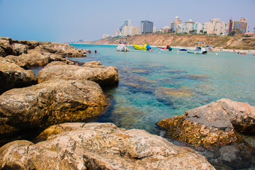 Beautiful seashore with breakwater and large stones