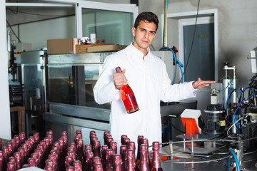 man working on wine production