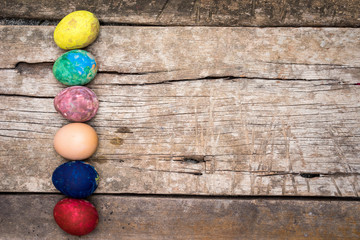 Easter eggs on wooden background 