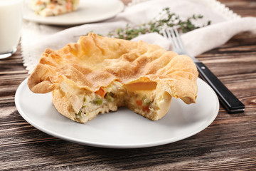 Delicious chicken pot pie on plate, closeup