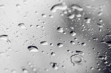 Closeup Of Rain Drops Through Window Glass