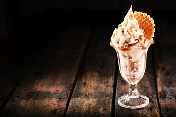 Delicious ice cream sundae with flake