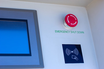 Red emergency stop button