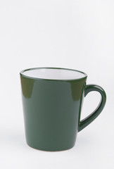 Green cup isolated on white background