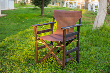 Outdoor furniture. Chair in hotel garden invite you to relax