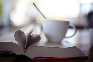 heart from pages of the book concept love tea coffee