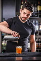 Fototapeta na wymiar Barman pouring alcohol