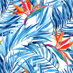 Watercolor tropical leaves and flowers summer seamless pattern.