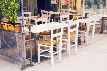 Fototapeta na wymiar Street cafe. Cozy outdoor restaurant