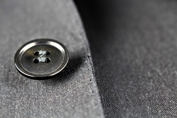An image of a suit botton