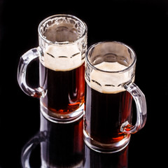 Mugs of beer, top photo