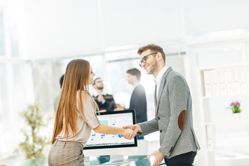 handshake between lawyer and client after reviewing the investment plan for development of the company.