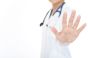 ストップのジェスチャーをする医師