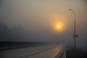 The road in the fog, the sunrise