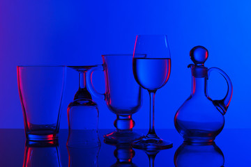 Glassware on blue background.