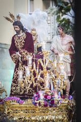 Brotherhood of Jesus corsage making station of penitence in front at the town hall, Linares, Jaen province, Andalusia, Spain