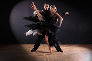 dancers in ballroom isolated on black background