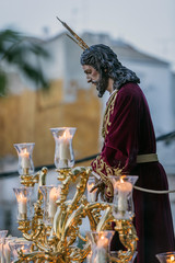 Brotherhood of Jesus corsage making station of penitence in front at the town hall, Linares, Jaen...