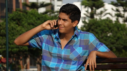 Teen Boy Using Cell Phone