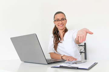 A young woman doctor With a laptop in her office