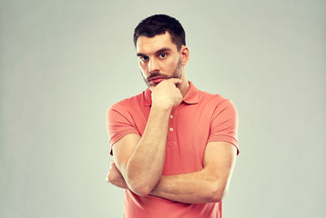 man thinking over gray background