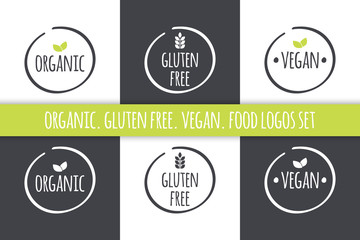 Food logos set. Organic Gluten Free Vegan labels. Vector grey white isolated symbols with green leaves