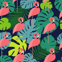 Seamless vector background with pink flamingos on a dark blue background.