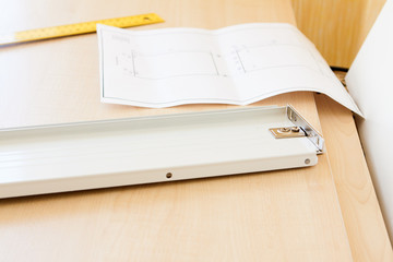 furniture accessories and drawings on chipboard