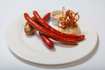 Mashed potato and roasted sausages